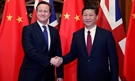 China's president Xi Jinping shakes hands with David Cameron. British ministers have been keen to pr