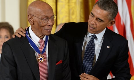 Former Chicago Cubs all-star infielder Ernie Banks is awarded the Presidential Medal of Freedom by US President Barack Obama in 2013.