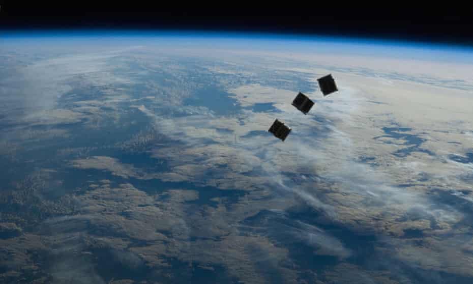 Three cube satellites released from the International Space Station.