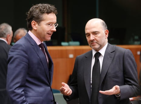 Eurogroup president Jeroen Dijsselbloem and EU Commissioner Pierre Moscovici chatting at the start of today's Eurogroup.