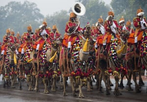 An Indian military band plays while riding camels during the nation's Republic Day Parade in New Delhi