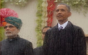 Rain failed to dampen spirits at India's Republic Day parade as  President Obama became the first US president to attend the spectacular military and cultural display