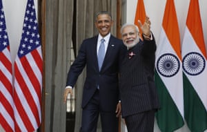 President Obama and Indian Prime Minister Narendra Modi wave to the media before a meeting