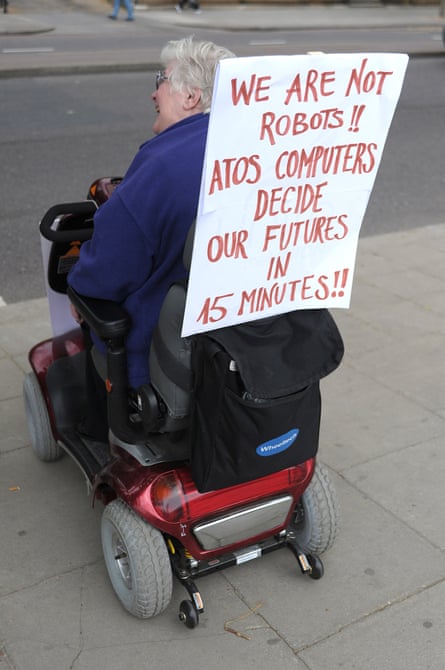 Disabled woman protesting against Atos assessments