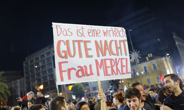Poster reads 'That's a really good night Frau Merkel', in a sign of how many feel about 'paymaster' Germany.