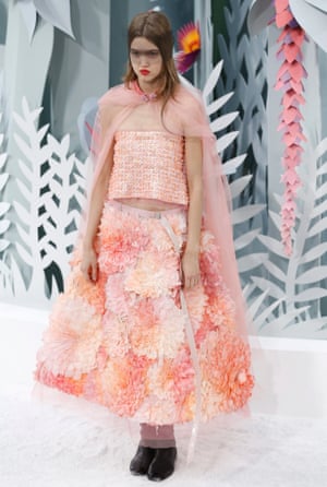 US model Lindsey Wixson presents a creation from Karl Lagerfeld's collection