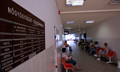 Women wait to see a doctor at public hospital in Budapest