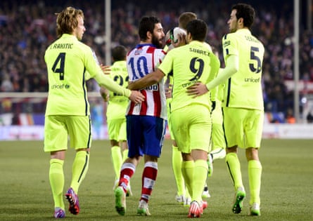 Arda Turan argues during the defeat to Barcelona.