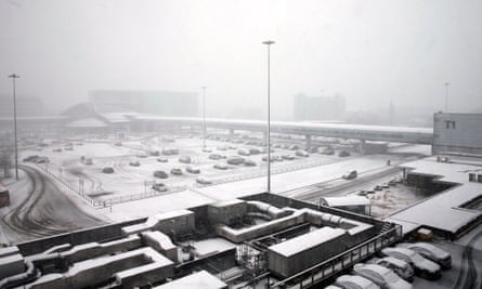 Terminal 1 at Manchester airport covered in a blanket of snow
