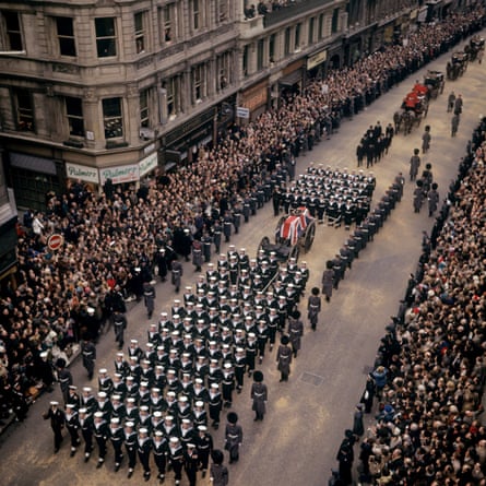 The funeral cortege on The Strand, with members of the family following