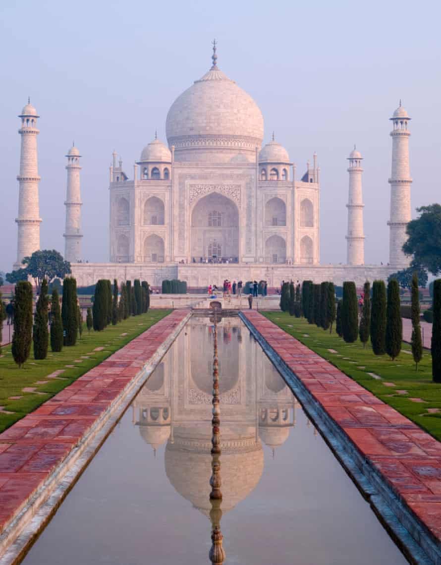 Pleasing symmetry …  the 17th-century Taj Mahal mausoleum in early morning light with reflection in Agra, Uttar Pradesh, India.