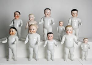 a gathering of victorian bathing dolls standing against a white background