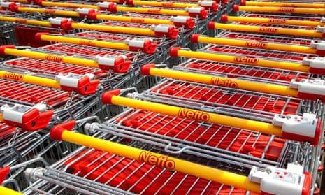 Shopping trolleys of discount food store Netto, Heideck, Bavaria, Germany