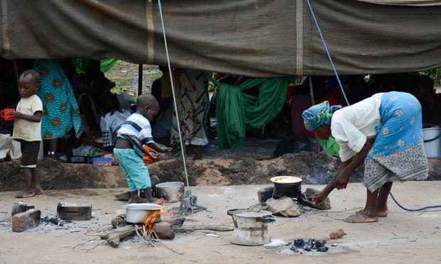 Displaced people are housed at the Sekeni  relief camp in Chikwawa, Malawi  Saturday, Jan. 17, 2015. Flooding in Malawi has killed more than 176 people, displaced at least 200,000 others, left homes and schools submerged in water and roads washed away by the deluge in the southern African country.