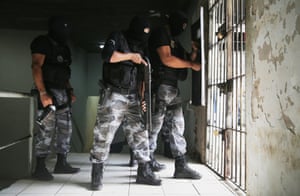 Miltary police patrol the prison