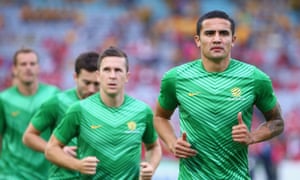 As usual, Tim Cahill leads the way as the Socceroos warm-up.