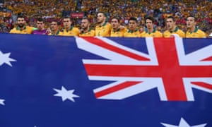 The Australian team belt out the anthem before the game.