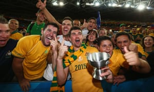 Mathew Ryan is mobbed by thrilled fans turned photo-bombers during the lap of honour.