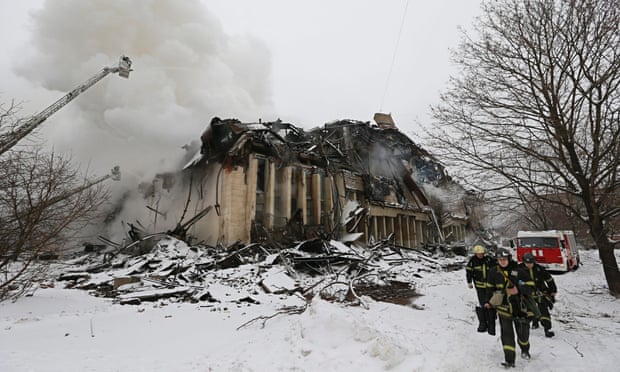 Firefighters extinguish a blaze in the library in Moscow, Russia