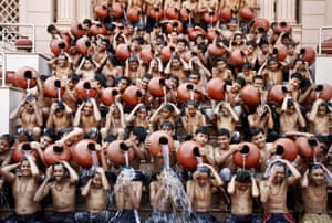 Ahmadabad, India Students pour water on each other as part of a ritual bath on the eve of Magh Purnima