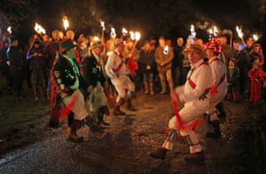 Bolney, UK Morris Men perform during an Apple Howling ceremony at Old Mill Farm