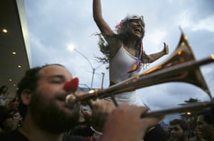 Rio De Janeiro, Brazil  Revelers march in a street party prior to Rio's Carnival