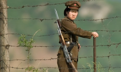 A North Korean soldier at the international border between North Korea and China on the Yalu river.