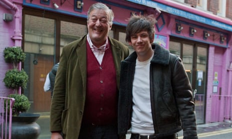 Stephen Fry and fiance Elliot Spencer leave Fry’s house in central London on Tuesday afternoon after Fry announced their engagement.