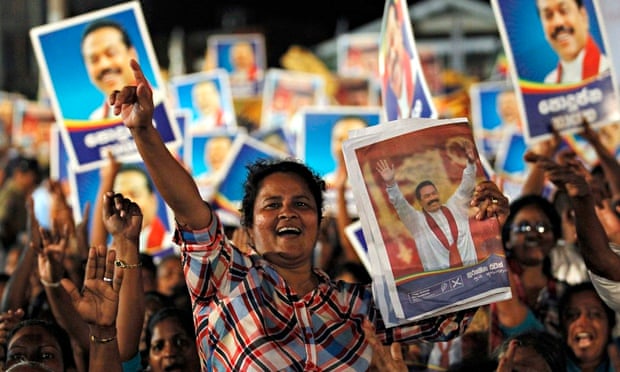 A supporter of Mahinda Rajapaksa cheers