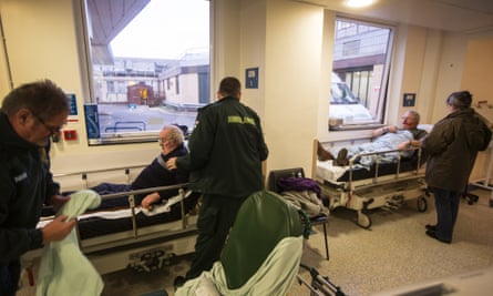 Patients await treatment in beds on corridors in the A&E unit at Addenbrooke's.
