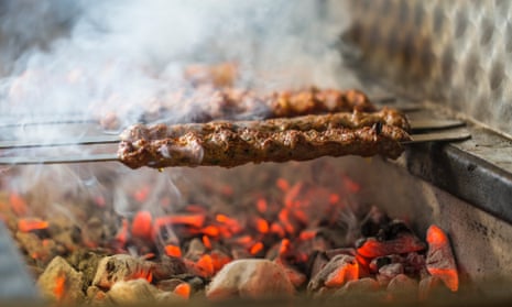Kebabs cooking over coals at Super Ocakbasi, Stoke Newington, London