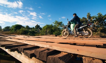 CBD workers traverse difficult terrain to reach some communities. In the wet season, some even have to carry their motorcycles across overflowing rivers