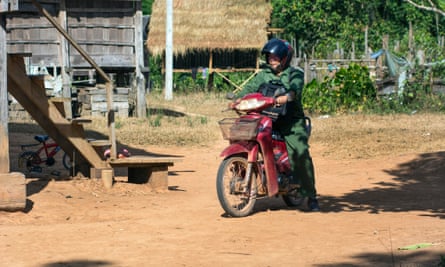 Kongphongma travels to neighbouring villages by motorcycle