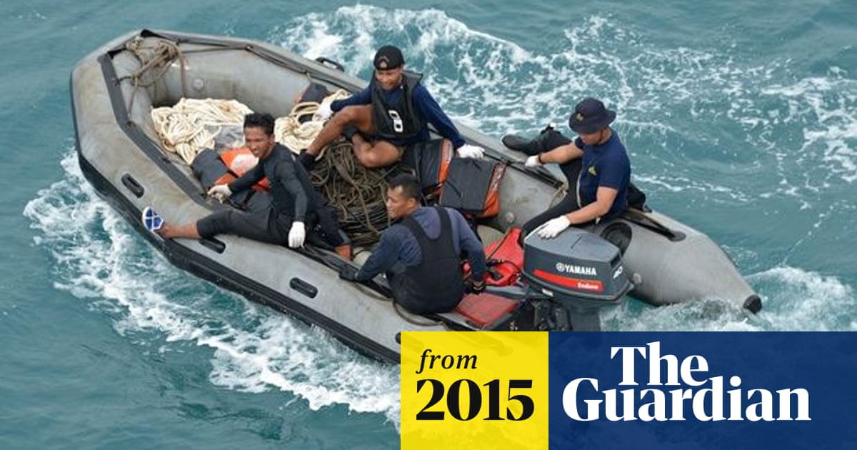 AirAsia flight: attempt to lift tail of plane and locate black boxes intensifies