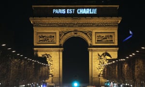 Paris is Charlie is projected onto the Arc de Triomphe in Paris, to pay tribute to the victims of a deadly attack on the headquarters of French satirical weekly Charlie Hebdo.