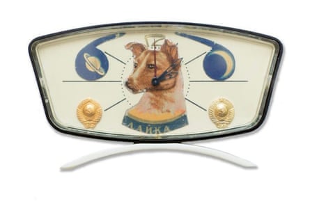 Desk clock with Laika and planets.