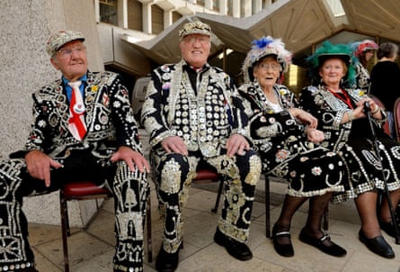 The Pearly Kings and Queens gather at the Guildhall Square to parade to St Mary-le-Bow church.