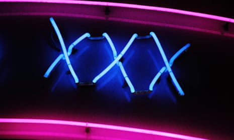 XXX neon sign advertising an adult licensed sex shop in a red light district