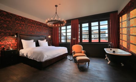 A spacious bedroom at Rooms Hotel