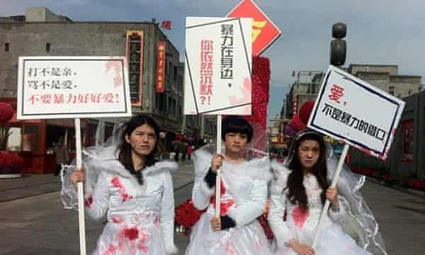 A protest in China by women wearing bloodstained bridal wear