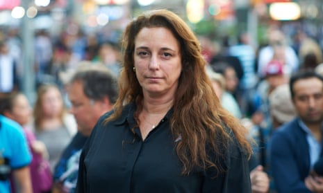 Tania Bruguera amid the hustle and bustle of Times Square, New York.