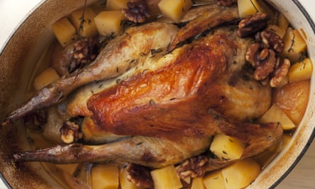 Pot roast guinea fowl with pears and walnuts