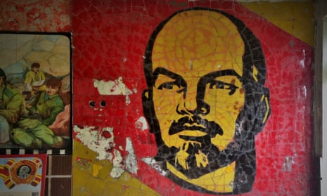 A complete Lenin mural in the rear foyer of a school.