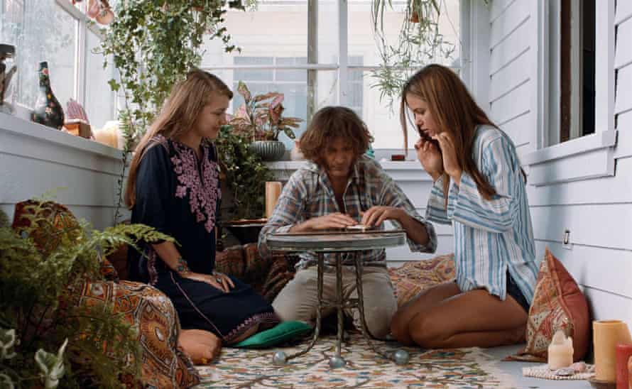 Joanna Newsom, left, with Joaquin Phoenix and Katherine Waterston in Inherent Vice