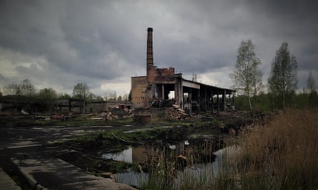 An abandoned factory and boiler house - much of the brickwork and piping was stripped from here and other technical facilities before the road entrances were blocked.
