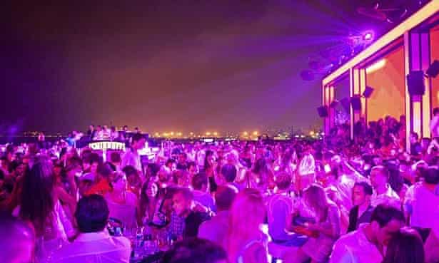 Crowds enjoy the drinks and the night-time view at Skybar, a rooftop bar in Beirut, Lebanon