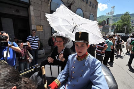 Tourists in costume at the street corner in downtown Sarajevo where Archduke Franz Ferdinand was assassinated.