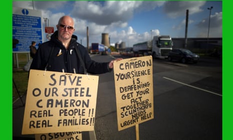 Demonstrators protest in support of the UK steel industry outside the Tata Steel processing plant at Scunthorpe, after Tata announced job losses.