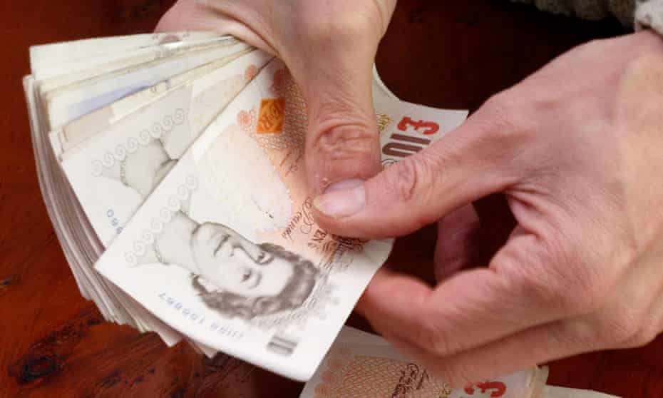 Pound notes being counted 