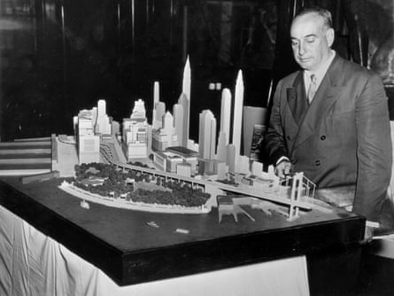 Robert Moses with a model of the lower end of Manhattan and the bridge with which it is proposed to connect Battery Park with Brooklyn, March 1939.